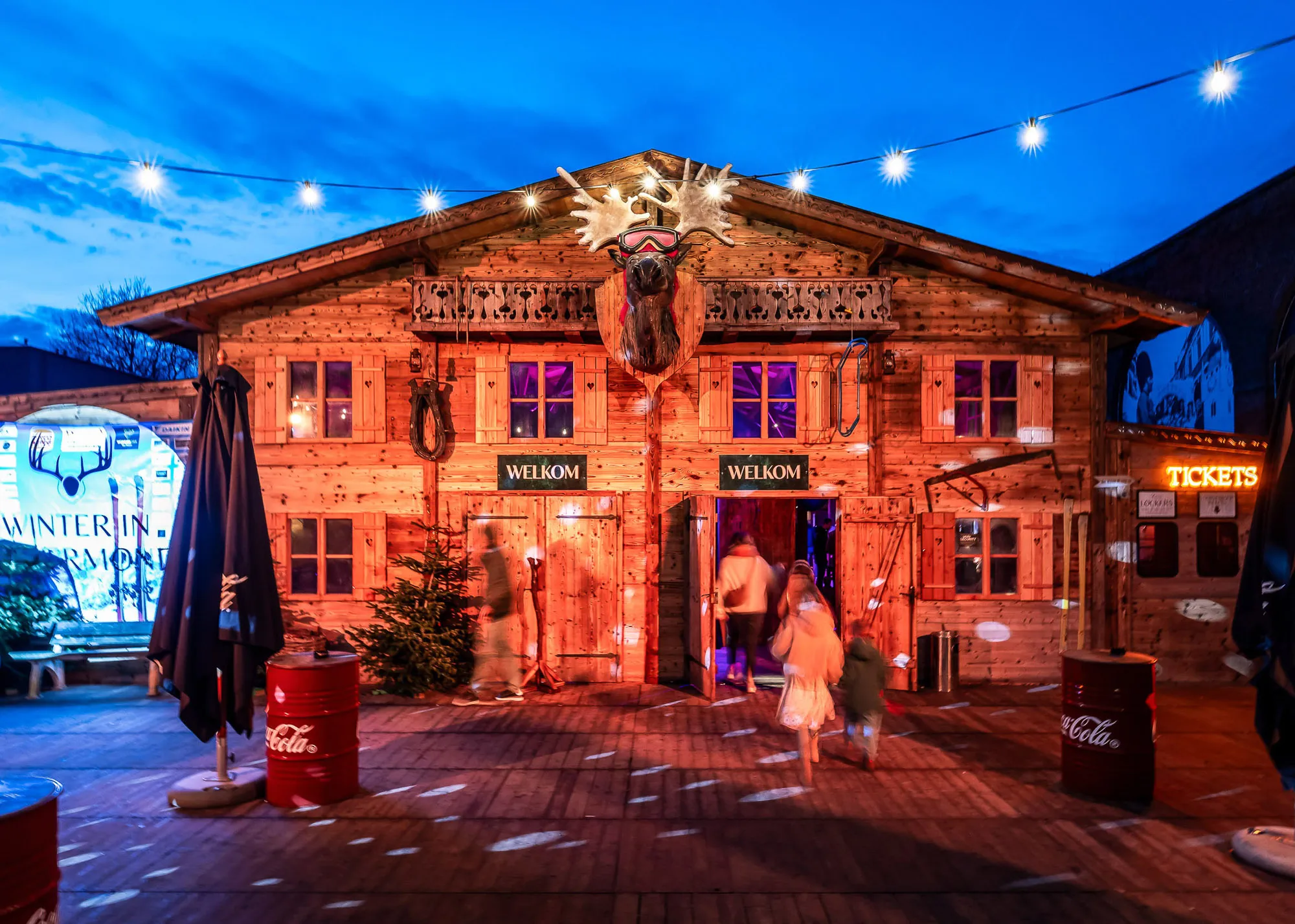 Corporate event held inside a spacious rustic barn venue