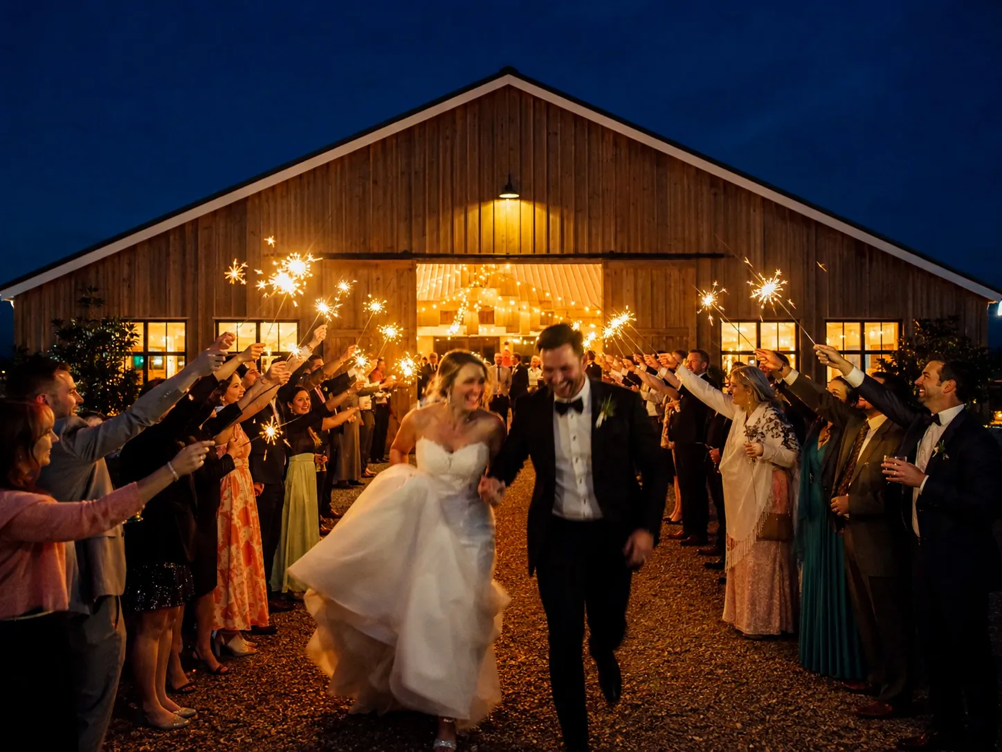 Private celebration event inside a rustic barn structure