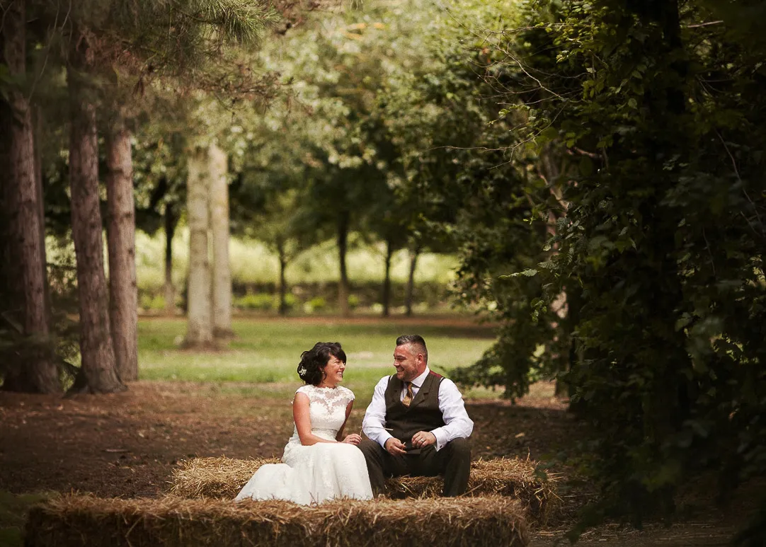 Garden wedding reception in Event Barn with rustic decor