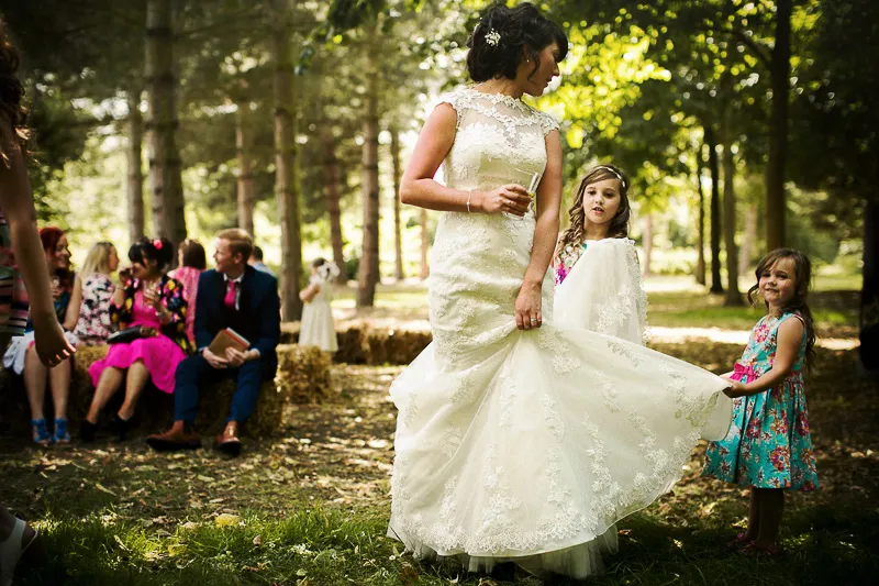 Wedding celebration detail inside the rustic marquee and decking setup