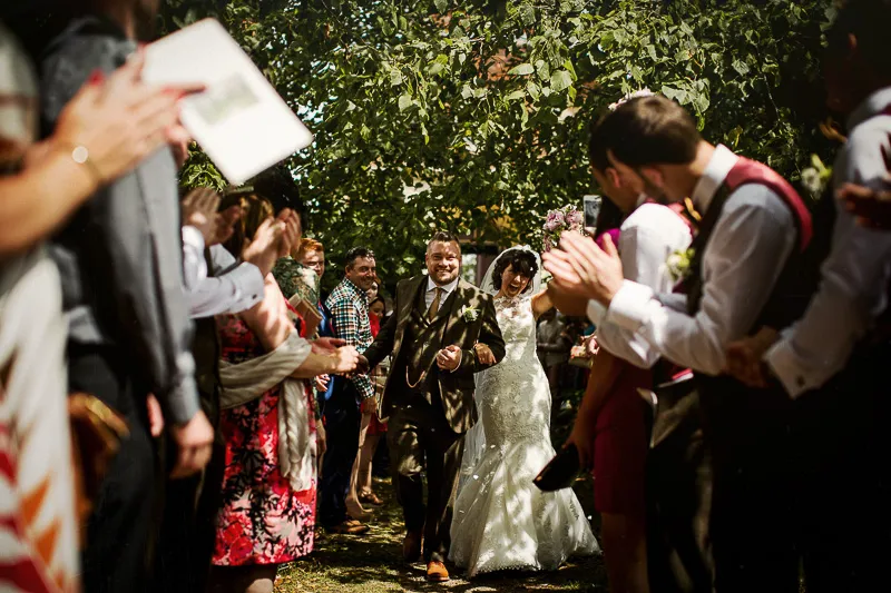 Candid wedding moment from Kate and Matt's Tree Cathedral celebration