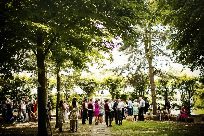 Wedding marquee with decking, walkway and rustic entrance details