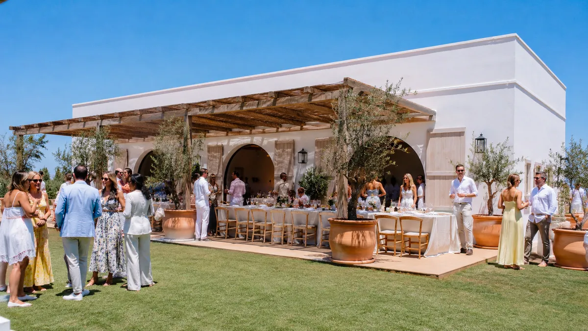 Private estate celebration in a rustic event structure